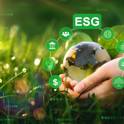 Environment social and 
governance in sustainable and ethical business. Hands holding crystal globe with  ESG icons. Using technology of renewable resource to reduce pollution